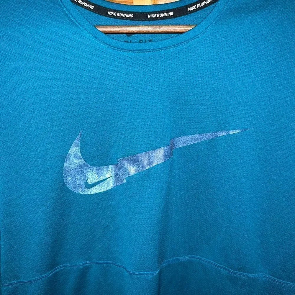 Nike DriFit teal blue/green men’s running shorty‎ size medium